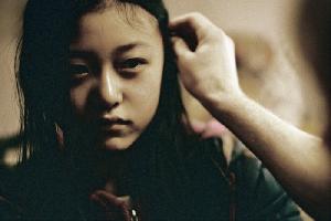 Su Li (Angel Li) ist eine der zwanzig illegalen Passagiere